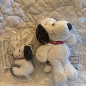 Two 50th Anniversary Snoopy Stuffed Animals